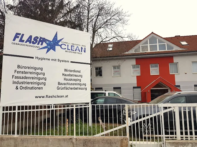 Standort der Büroreinigung Flash Clean in Wiener Neudorf – Firmengebäude mit Leistungstafel Standort der Büroreinigung Flash Clean in Wiener Neudorf – Firmengebäude mit Leistungstafel